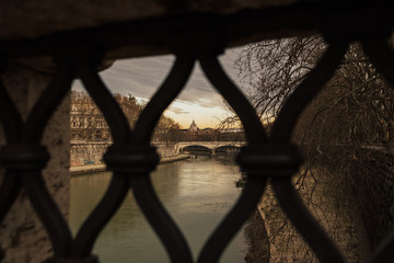 St. Peter's cathedral over bridge and Tiber river in Rome, Italy. Skyline with Vatican Basilica of...