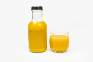 Fresh pumpkin juice in glasses and bottles , Healthy fruit. On white background