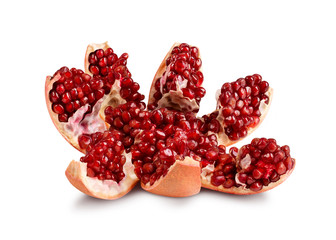 Ripe open pomegranate on a white background. Juicy pomegranate closeup. Opened pomegranate fruit.