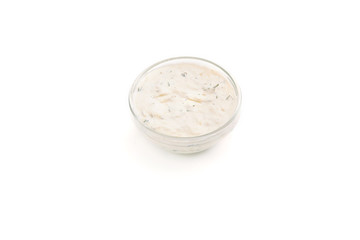 Cheese sauce in a bowl isolated on white backround.