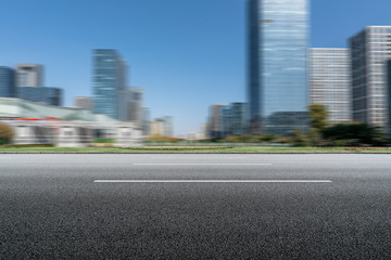 Obraz premium Urban road and modern office building of Ningbo business district..