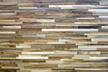 slim stacked tan brown cream slate rock wall distance view