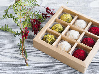 christmas decoration. Multi-colored candy in a gift box. Holidays and greetings