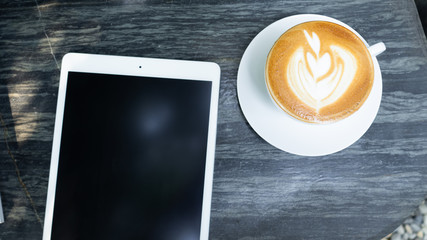 Heart shape coffee late on the stoney table. For coffee lover. Copy-space.