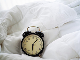 alarm clock on table in the bed room on morning