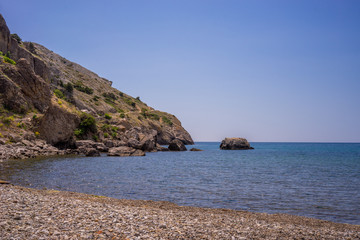 Fototapeta na wymiar Seascape with rocks on the background of water