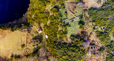 Obraz premium Aerial view of abandoned town at Drumboghill between Rossbeg and Portnoo in County Donegal - Ireland