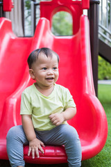 Fototapeta na wymiar little boy on the playground. portrait normal angle shot.