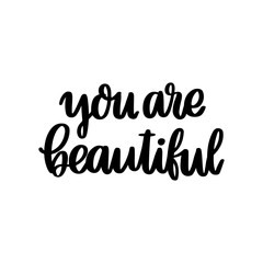 The hand-drawing inspirational quote: You are beautiful, in a trendy calligraphic style. It can be used for card, mug, brochures, poster, t-shirts, phone case etc.