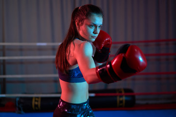 Female kickboxer training