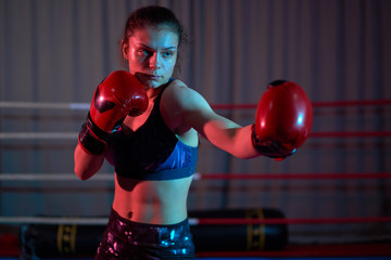 Female kickboxer training