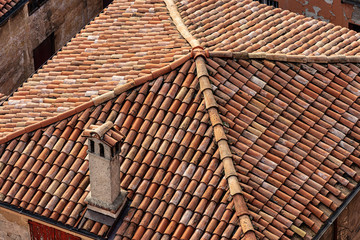 Pantiles. Closeup of an old house roof with tiles made from clay (Coppo in Italian language), seen...