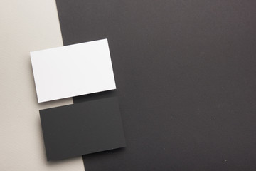 Business card blank on wooden background. Corporate Stationery, Branding Mock-up. Creative designer desk. Flat lay. Copy space for text