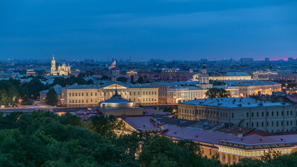 Naklejka na ściany i meble Building of Kunstkamera and the cityscape night to day timelapse viewed from the colonnade of St. Isaac's cathedral.