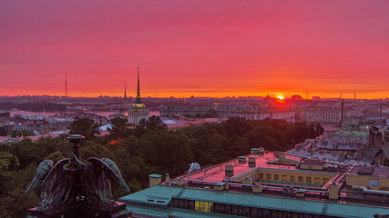 Sunrise over historic center from the colonnade of St. Isaac's Cathedral timelapse.