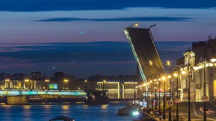 Fototapeta na wymiar Span of the Liteyny Bridge is lifted over the river Neva timelapse