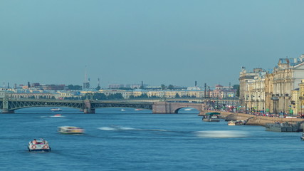 Fototapeta na wymiar Trinity bridge timelapse and pier on the Palace embankment clear day in summer in Saint-Petersburg
