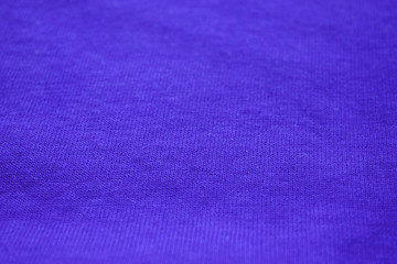 Blue fabric texture background. Empty blue cloth surface, simple cotton material canvas, blank dark blue clothing element to use as template or mockup 