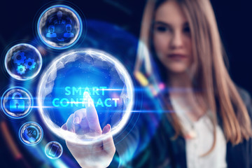 Business, Technology, Internet and network concept. Young businessman working on a virtual screen of the future and sees the inscription: Smart contract