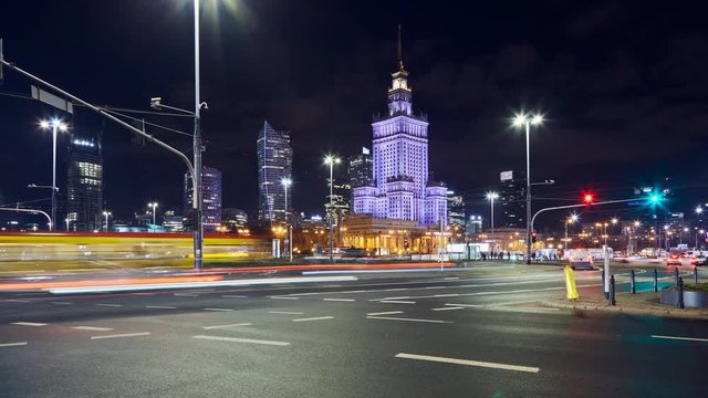 Night timelapse of a busy cross road in Warsaw, Poland