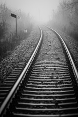 Fototapeta na wymiar Railway track disappear in fog