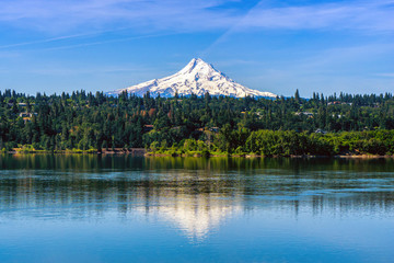 Mt Hood covered with snow over Hood River and reflecting on the Columbia River, Oregon. Shot taken...