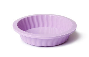 silicone mold for baking on a white background. Culinary accessories of the baker. Small baking cups. It is isolated.