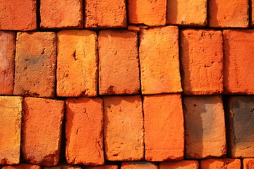 Fototapeta premium Red brick in the earthen canal during construction tropical.
