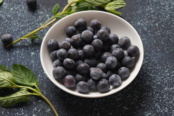 Blueberry antioxidant organic superfood in a bowl concept for healthy eating and nutrition. Close-up