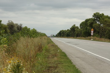  asphalt road, the highway where bulky transport goes outside the city