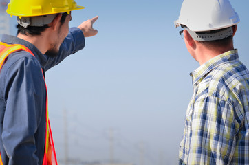 two construction engineer planning to job at site