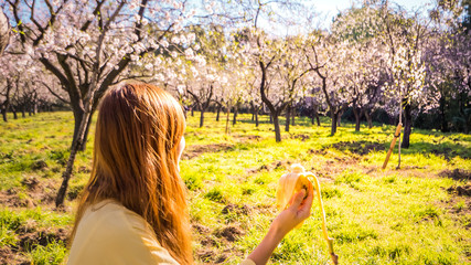 Healthy diet concept and life enjoyment outdoors with first spring flowers in a beautiful park....