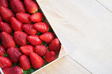 strawberries in a box, flat lay 
