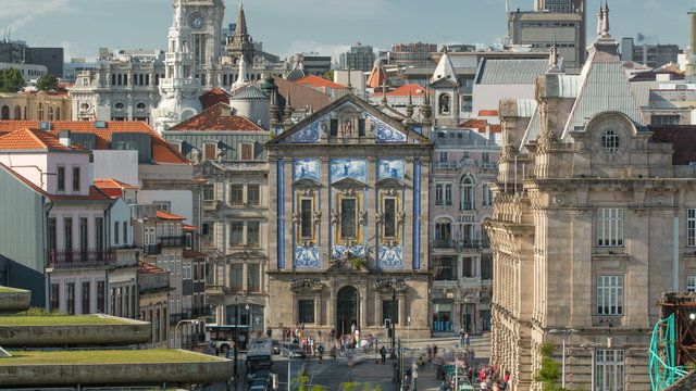 View of the Almeida Garret Square with the Sao Bento railway station and Congregados Church at the back timelapse.