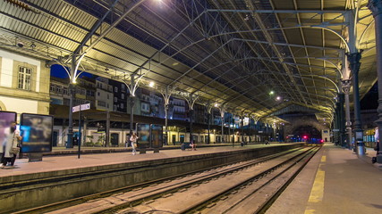 Fototapeta na wymiar Train at platform of Sao Bento Train Station timelapse in Porto, Portugal.