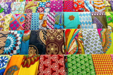 Plenty of colorful African fabrics in a rows - obrazy, fototapety, plakaty