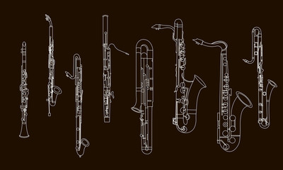 White outline various musical instruments, the contour of clarinets, oboe, saxophones, bassoon and contrabassoon on a black background