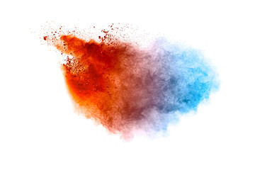 Orange blue  powder explosion on white background.Orange blue color dust splash clouds.