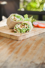 Wrap chicken or tasty kebab with vegetables