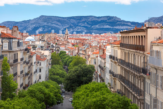 Fototapeta Aerial view of historical city center of Marseilles and Montee de la bonne Mere, France
