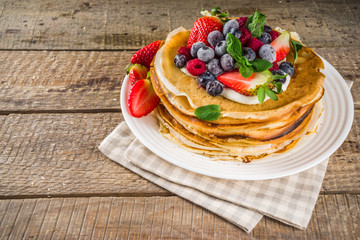 Sweet crepes with berries