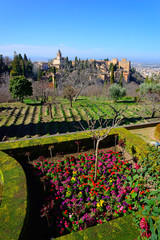 Granada, Spain - February 20, 2020: Part of the Alhambra and its gardens.