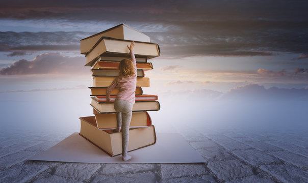 Young Preschool Girl Climbing up Book Pile on Abstract Sunset Landscape Background. Studying - Learning Concept. Knowlage Symbol.