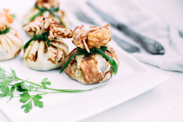 Pancakes with mushroom filling with sour cream