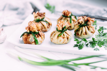 Pancakes with mushroom filling with sour cream
