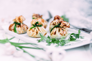 Pancakes with mushroom filling with sour cream
