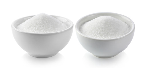 white sugar in white bowl on white background