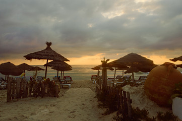 Beach view with sky covered in rain clouds