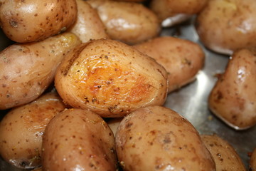 Roasted potatoes in the oven close-up