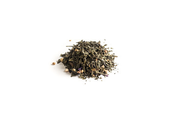 different sorts of black or green tea in bulk  on a white background close-up isolated